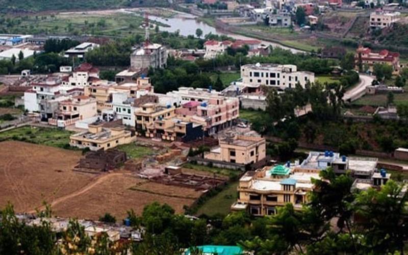 القادر ٹرسٹ کیس: اشتہاری ملزم کی بنی گالہ میں 405 کنال اراضی نیلام