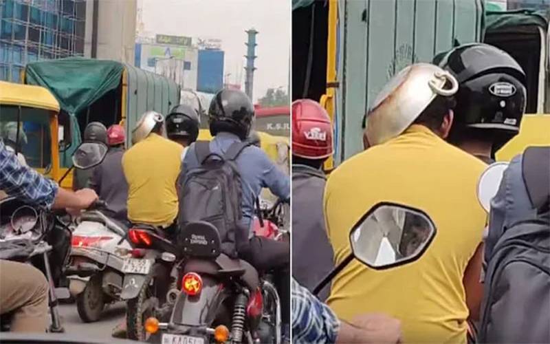 موٹرسائیکل سوار نے کڑاہی کو بطور ہیلمٹ استعمال کرنا شروع کردیا